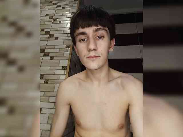 Marksynergyx (19, White Cam Boy) performing cumshot.